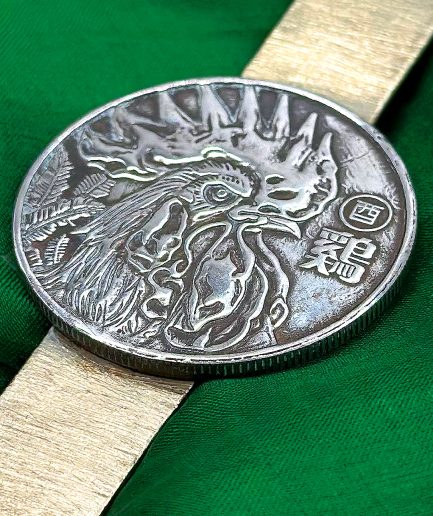 Prendedor Moneda China